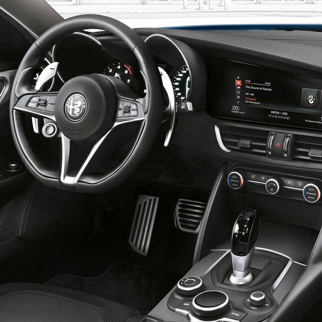 Motor vehicle, Steering part, Automotive design, Steering wheel, Automotive mirror, Center console, White, Car, Vehicle audio, Personal luxury car, 