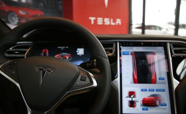 Driver was behind wheel at time of Texas Tesla crash, NTSB says