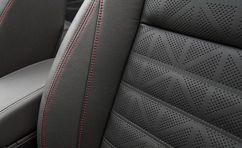 Motor vehicle, Car seat, Car seat cover, Head restraint, Leather, Vehicle door, Carbon, Luxury vehicle, Silver, Seat belt, 