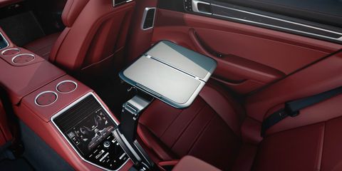 Motor vehicle, Automotive design, Red, Car seat, Center console, Luxury vehicle, Carmine, Car seat cover, Steering part, Leather, 