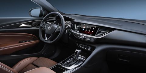 Motor vehicle, Steering part, Mode of transport, Automotive design, Steering wheel, Transport, Automotive mirror, Center console, White, Car, 