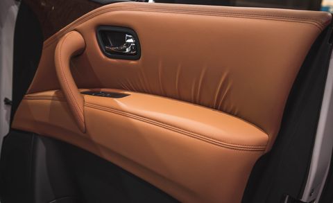 Automotive design, Brown, Car seat, Leather, Luxury vehicle, Tan, Beige, Personal luxury car, Vehicle door, Car seat cover, 