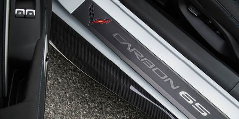 Automotive exterior, Logo, Parallel, Carbon, Bumper, Synthetic rubber, Steel, Symbol, 