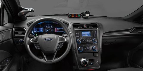 Land vehicle, Vehicle, Car, Center console, Ford motor company, Motor vehicle, Gear shift, Mid-size car, Ford, Automotive design, 