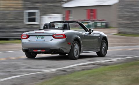 2017 fiat 124 spider convertible driving with the top down