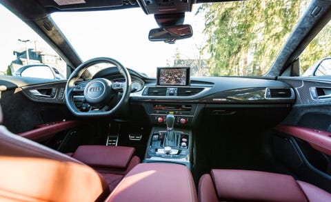 motor vehicle, interior, steering part, mode of transport, automotive mirror, steering wheel, automotive design, transport, glass, center console, vehicle audio,