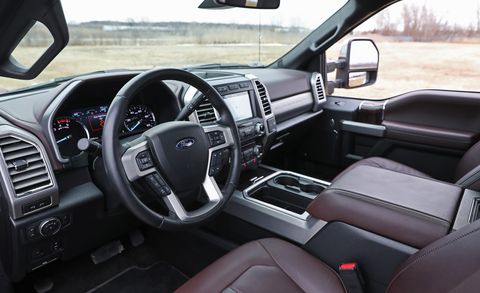 land vehicle, interior, vehicle, car, motor vehicle, steering wheel, ford super duty, rim, center console, tire, automotive tire,