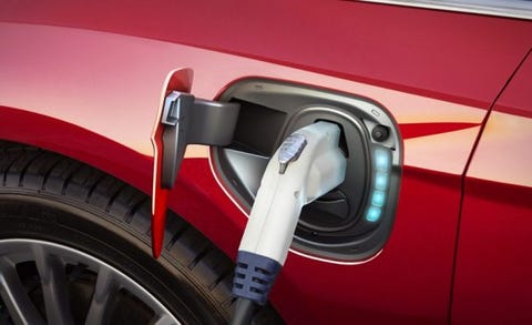 The 7500 Ev Tax Credit Lives On In New Bill News Car And Driver Electric Car With Charger