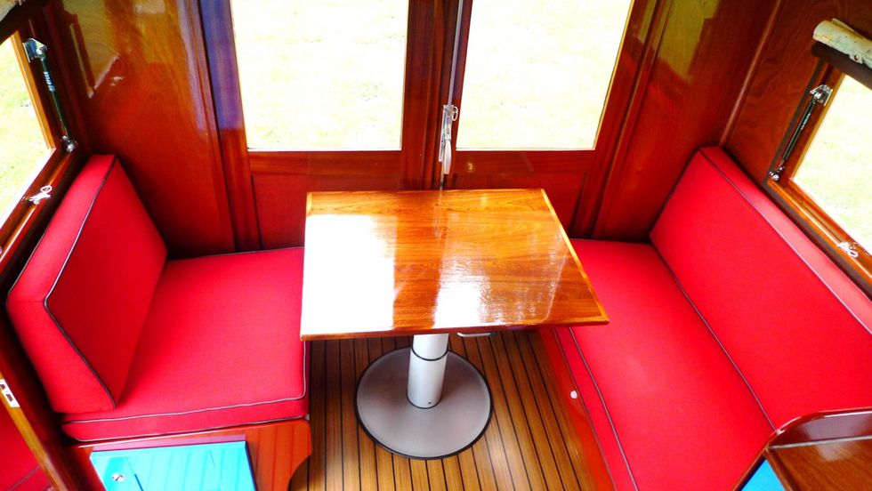 Room, Orange, Furniture, Table, Wood, Cabin, Interior design, Chair, 