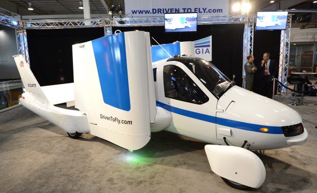 The wings fold up in a demonstration of the Terrafugia "Flying Car" during the first day of press previews at the New York International Automobile Show April 4, 2012.