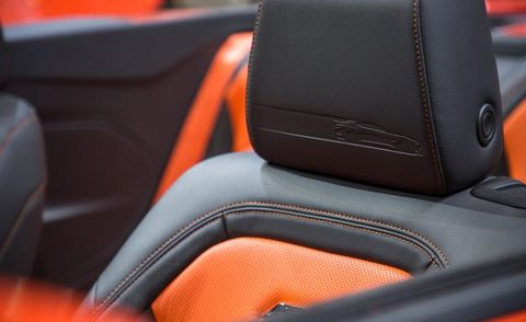 Vehicle, Car, Orange, Leather, Center console, Car seat cover, Car seat, Supercar, Armrest, 