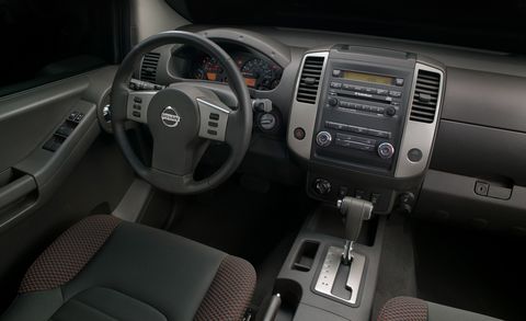 Vehicle, Steering wheel, Center console, Car, Nissan, Steering part, Vehicle audio, Car seat, Nissan navara, Speedometer, 
