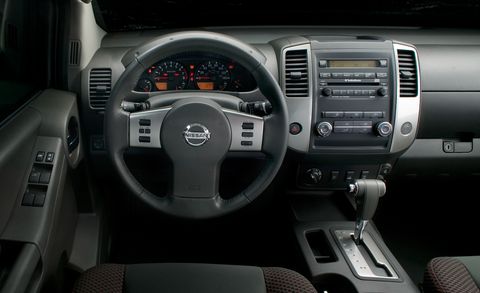 Land vehicle, Vehicle, Car, Steering wheel, Center console, Nissan, Nissan navara, Steering part, Speedometer, Vehicle audio, 