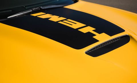Yellow, Vehicle, Orange, Automotive design, Car, Hood, Font, Logo, 