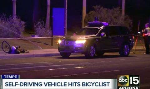 This March 19, 2018 still image taken from video provided by ABC-15, shows investigators at the scene of a fatal accident involving a self driving Uber car on the street in Tempe, Ariz. 