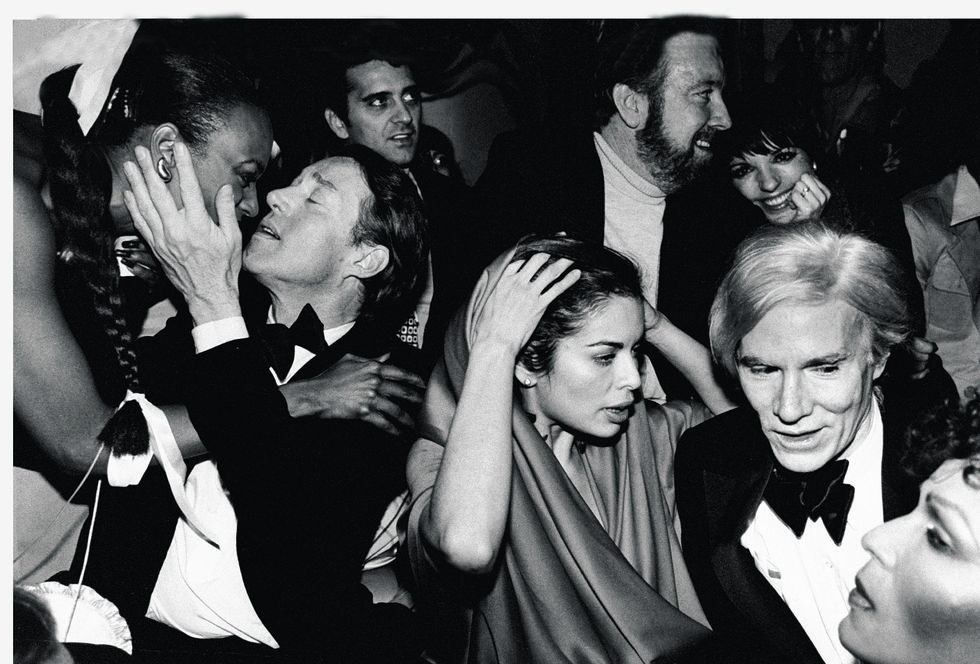Halston [kissing unidentified], Bianca Jagger, Jack Haley Jr. and wife Liza Minnelli, Andy Warhol.