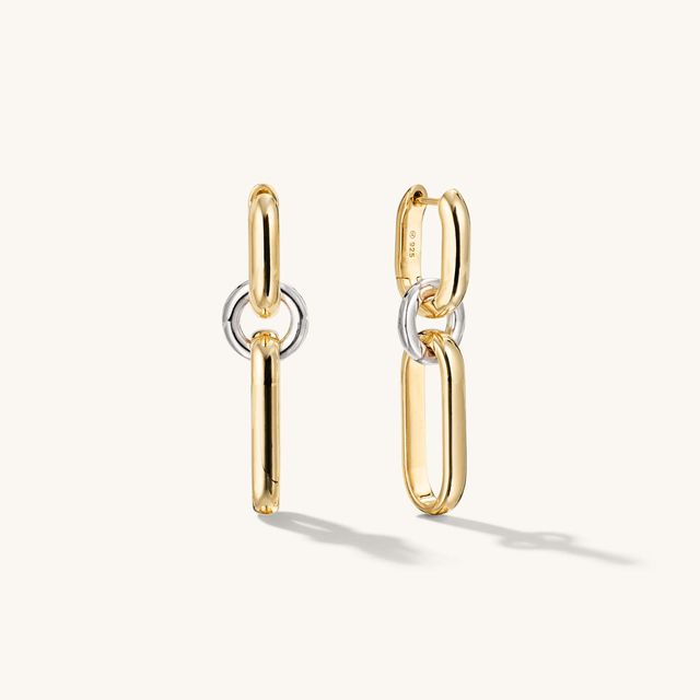 a set of gold and silver earrings
