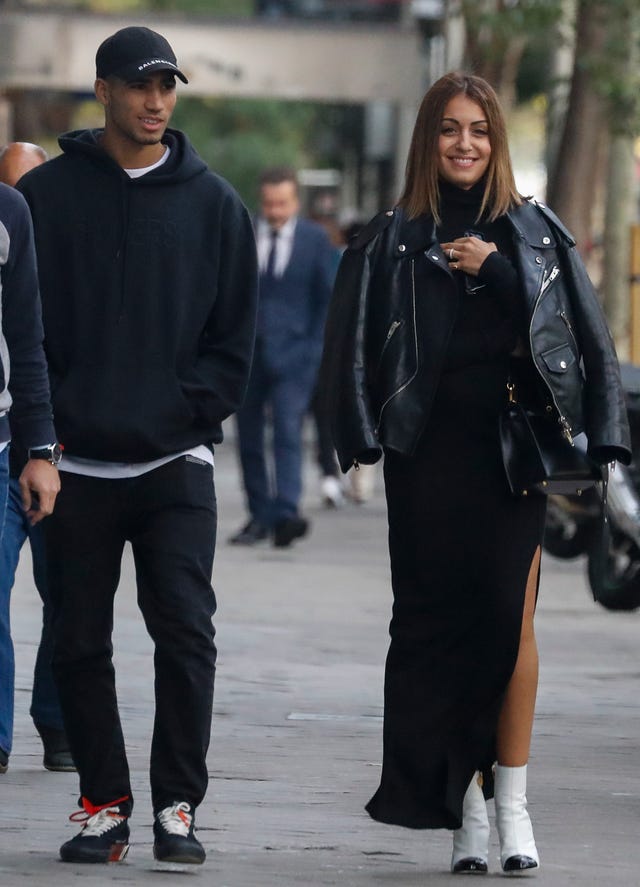 Street fashion, Clothing, Fashion, Standing, Outerwear, Footwear, Human, Sunglasses, Shoe, Jacket, 