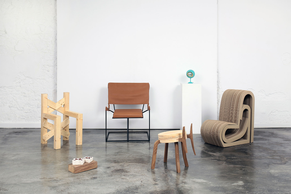 modern furniture arrangement with diverse seating options on a polished floor