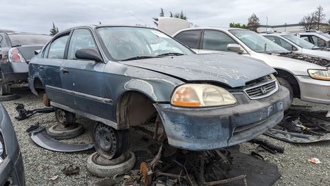 1996 honda civic sedan in junkyard with 435k miles