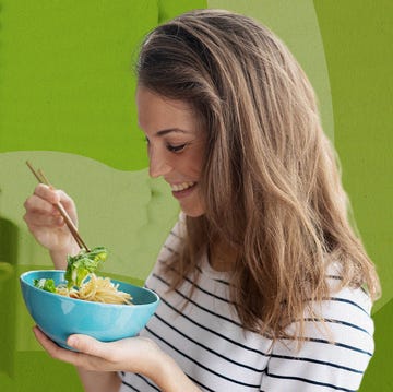 woman eating salad