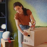 woman packing up a box