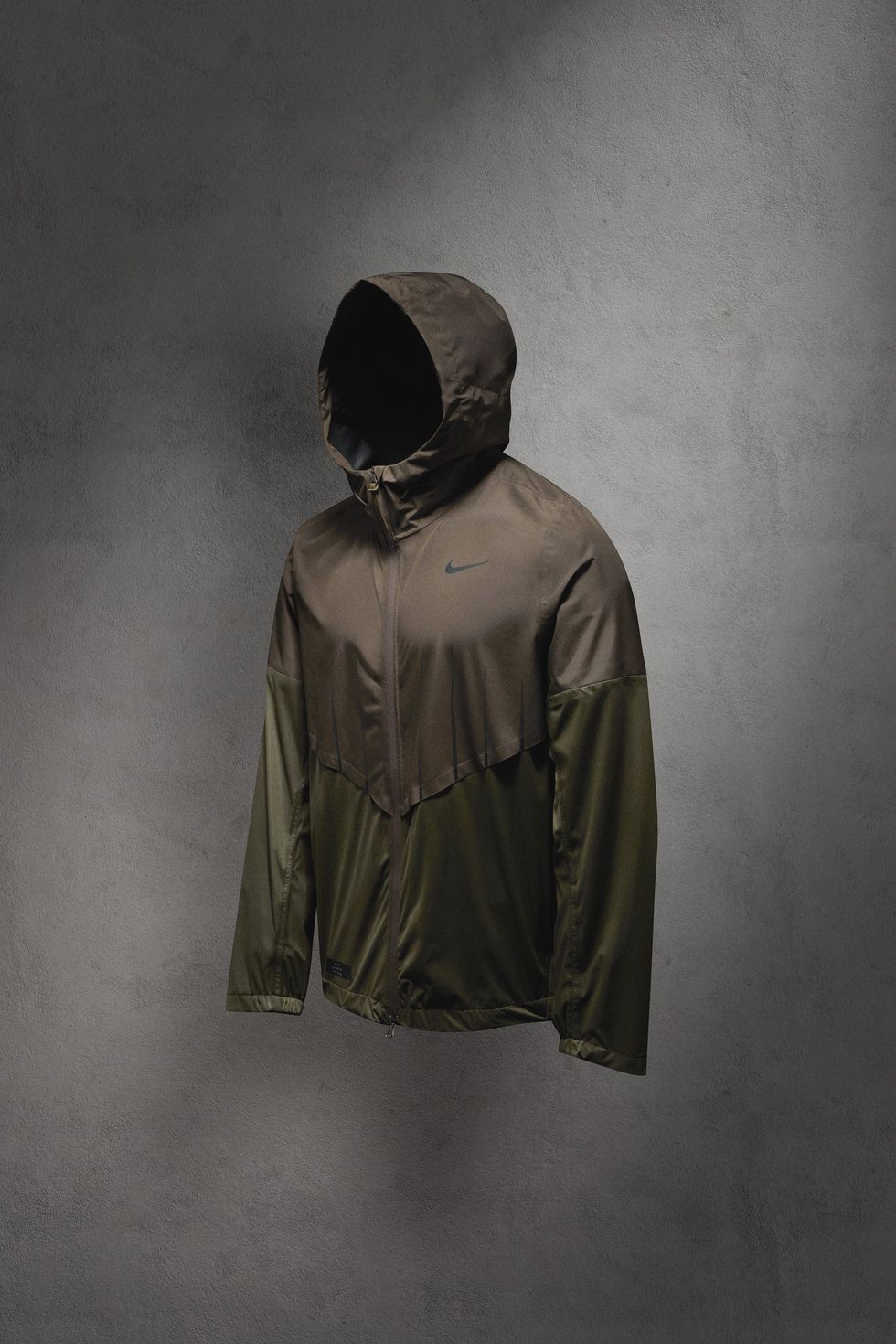 transmisión Viajero policía La chaqueta interactiva de Nike que regula la temperatura corporal y la  ventilación mientras corres
