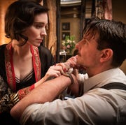 This is an image rooney mara and bradley cooper in the film nightmare alley photo by kerry hayes © 2021 20th century studios all rights reserved