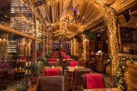 Building, Restaurant, Lighting, Room, Interior design, Architecture, Ceiling, Furniture, Plant, Interior design, 