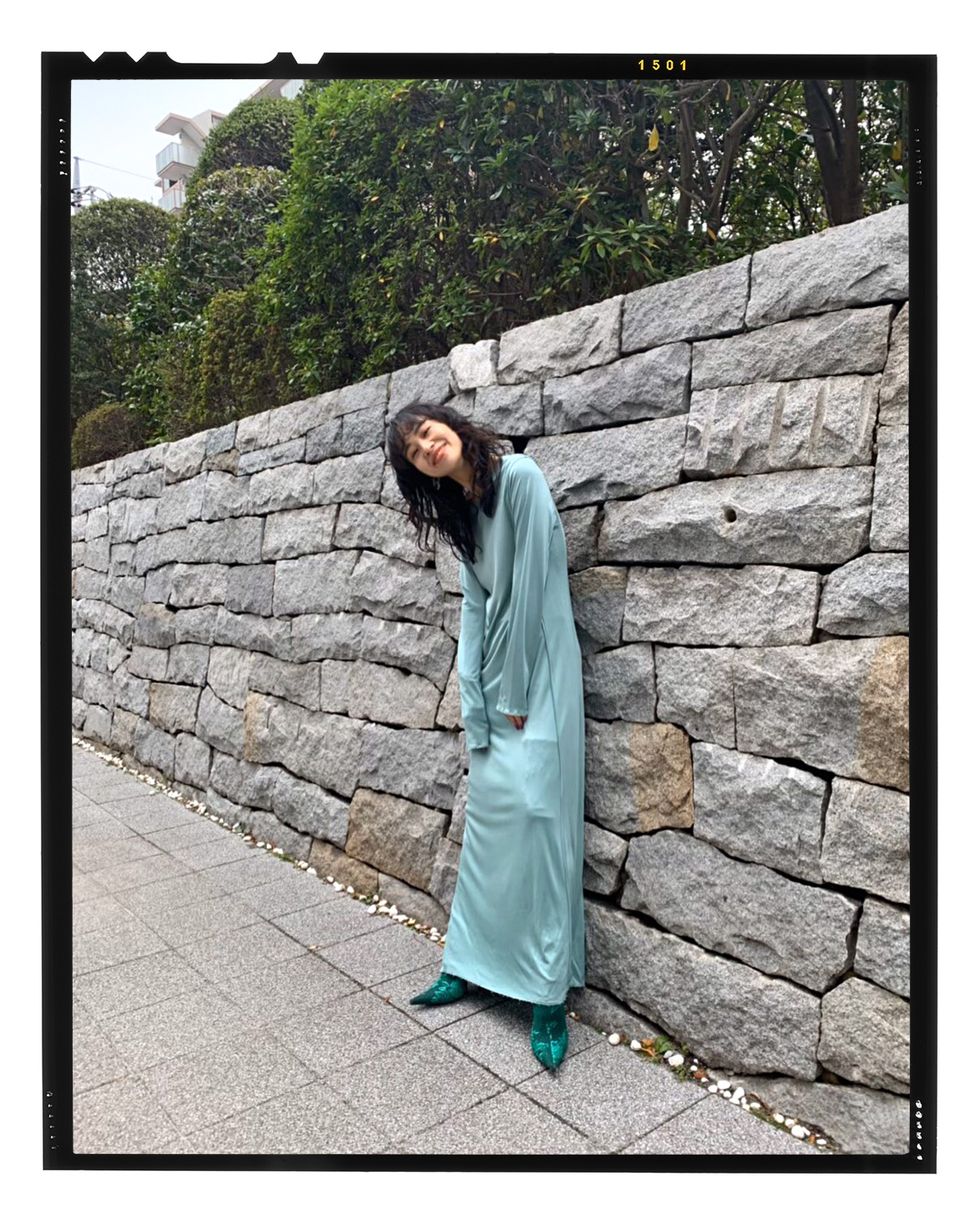 Photograph, Green, Outerwear, Wall, Turquoise, Street fashion, Stock photography, Photography, Abaya, Textile, 
