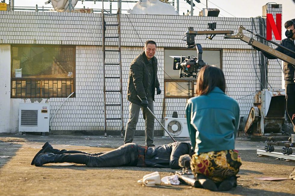 a person lying on the ground with a camera on the head