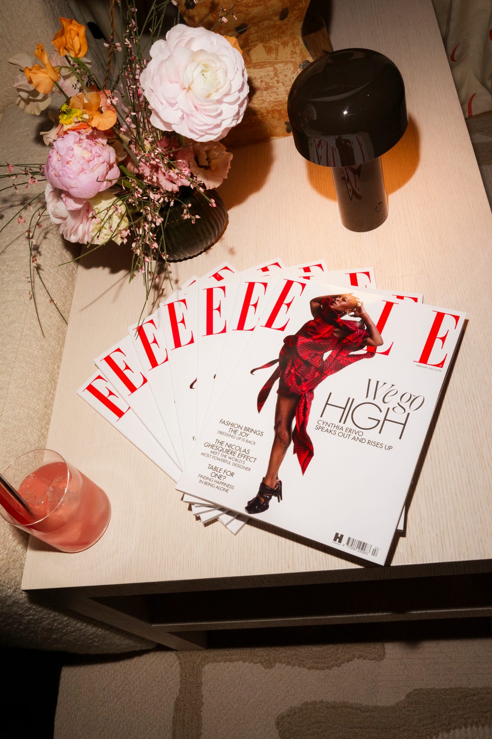 magazines and decorative items on a table