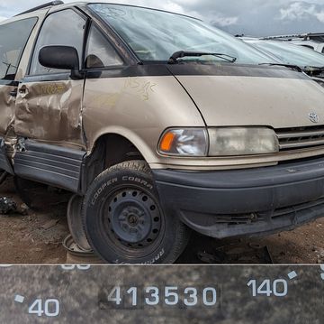 1995 toyota previa with 413k miles in junkyard