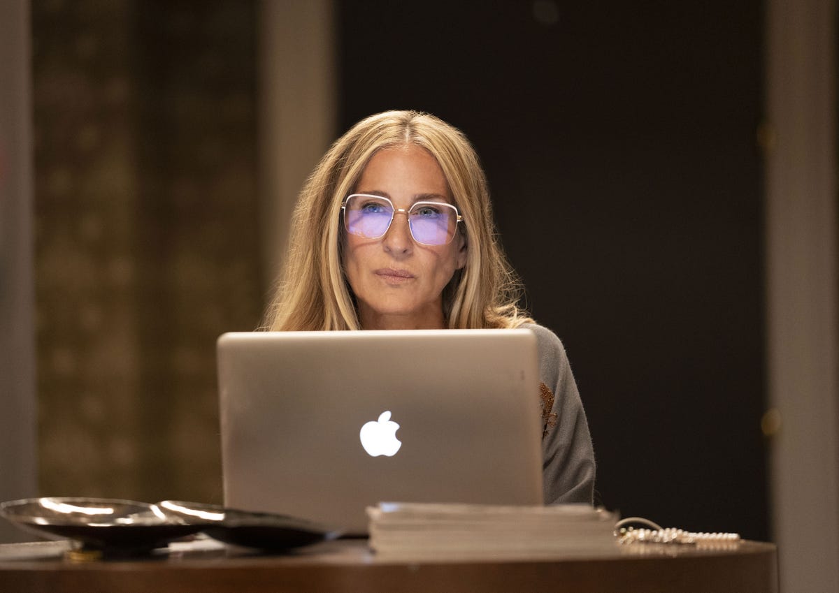 carrie bradshaw at a laptop