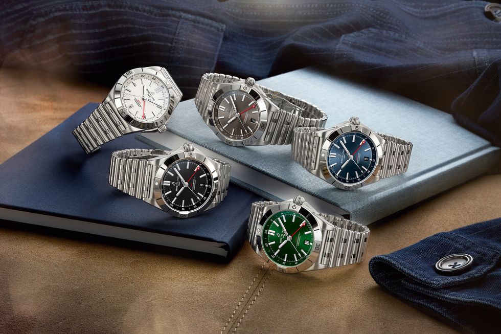 breitling chronomat automatic gmt 40 from left to right white, black, anthracite, blue, green dialrgb