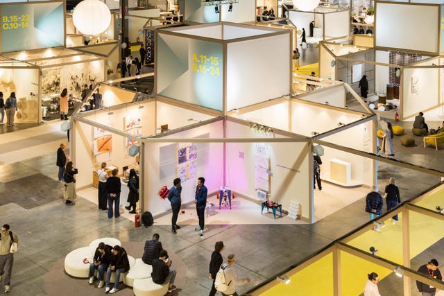 an exhibition hall with visitors