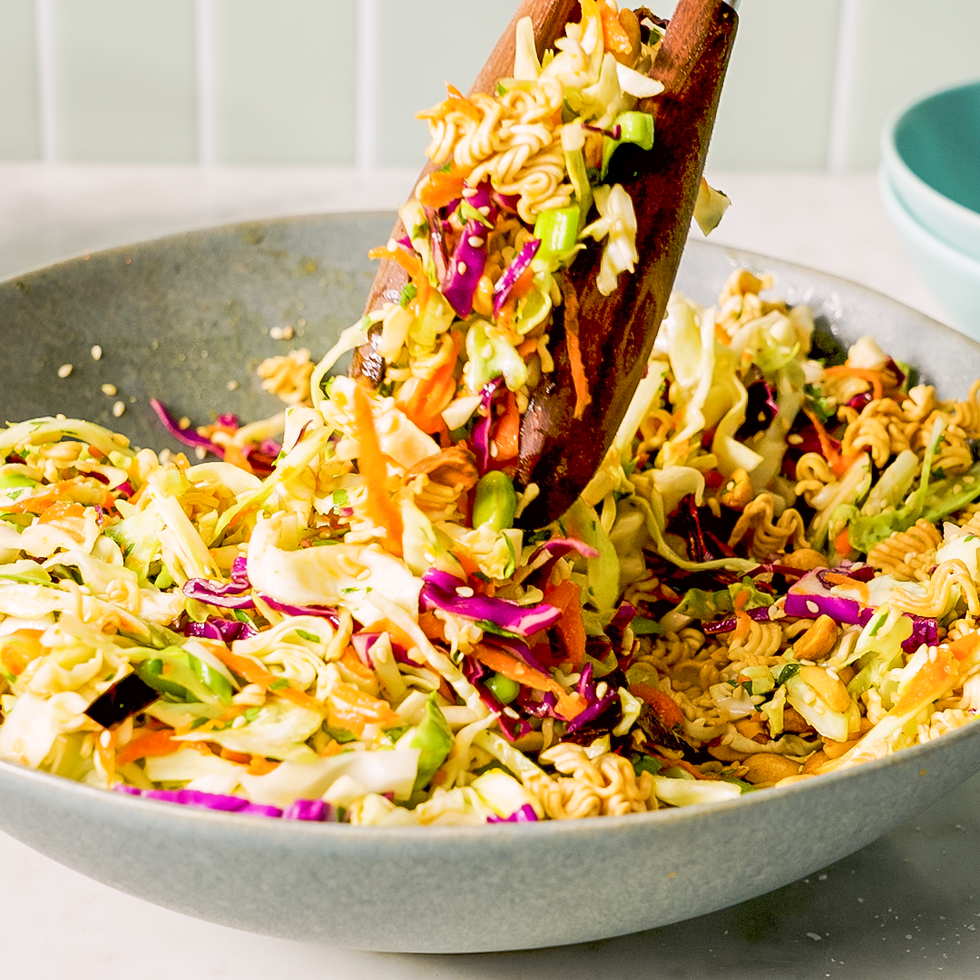 tossing together a ramen noodle salad