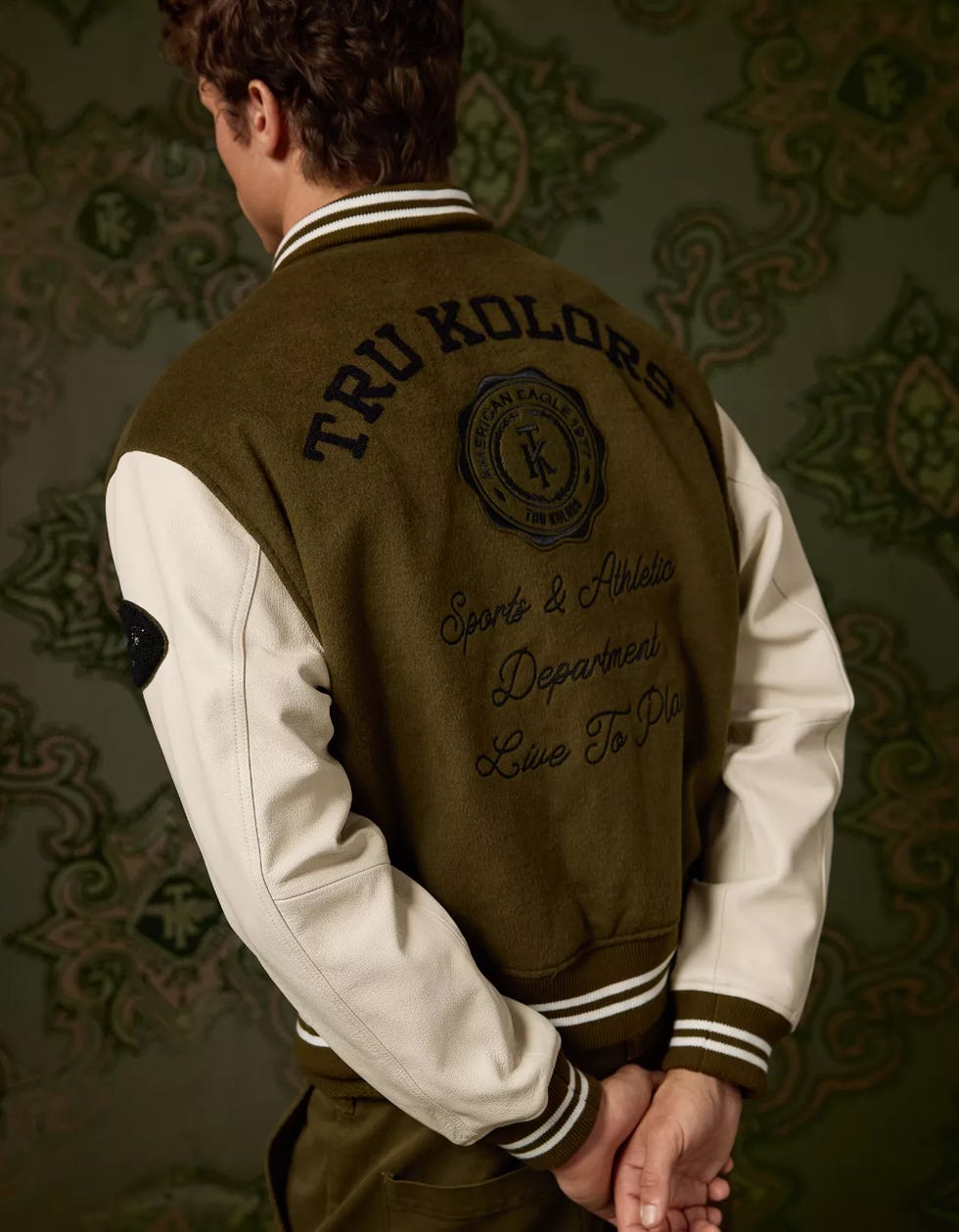 a varsity jacket from the collaboration.