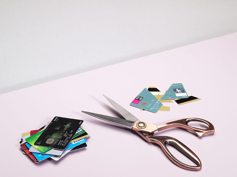 cut up credit cards next to scissors