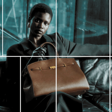 a person sitting on a leather couch holding a brown handbag a person sitting on a leather couch holding a brown handbag