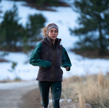 how cold is too cold to run a woman british running in the winter along a snowy path