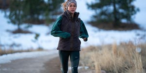how cold is too cold to run a woman running in the winter along a snowy path