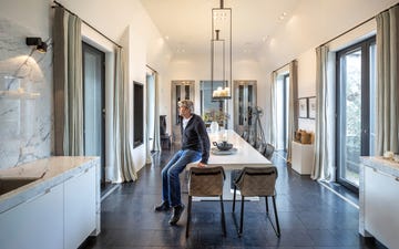 modern kitchen and dining area with expansive table and stylish decor