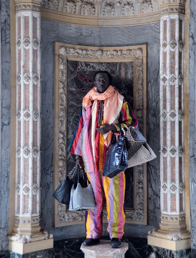 Outerwear, Temple, Architecture, Costume, Art, Statue, Visual arts, Vacation, History, 