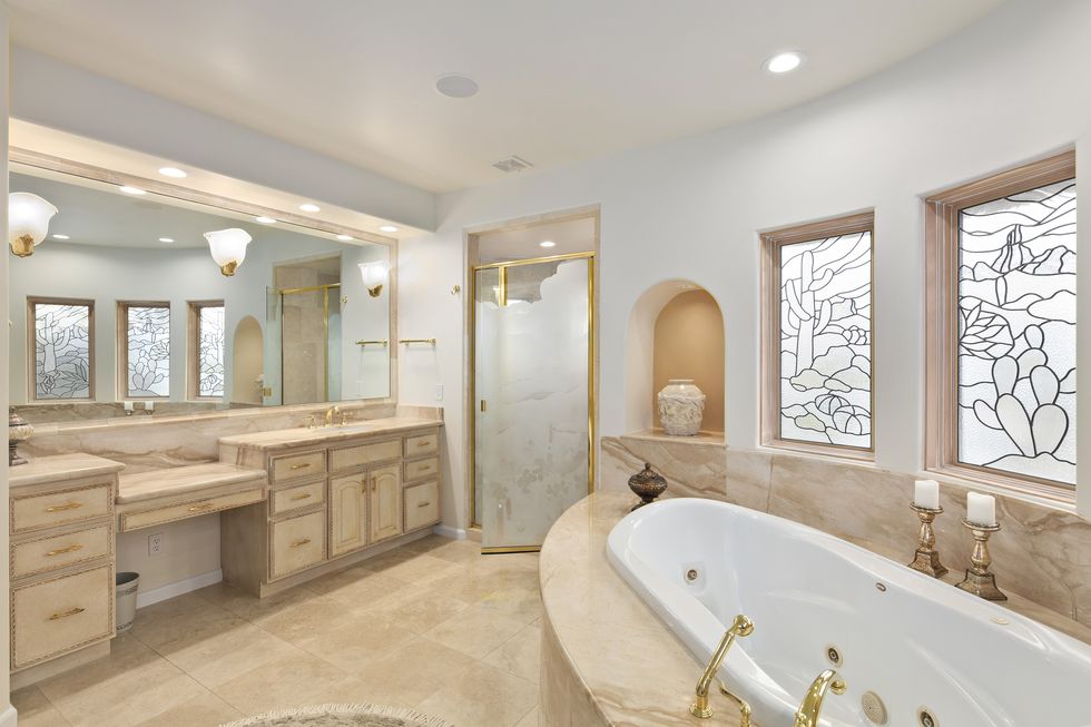 7 Luxury Homes With Over-the-Top Bathrooms on the Market Right Now