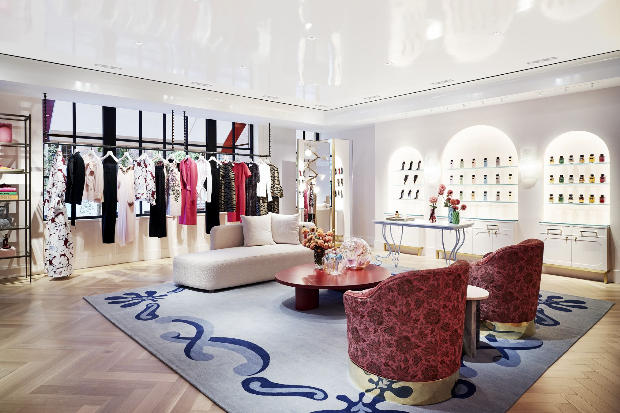 A List 2022 - ELLE DECOR womenswear and fragrances are displayed in a living room–like setting on the second floor carolina herrera