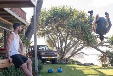 Kettlebell, Tree, Games, Bocce, Flip (acrobatic), Plant, Palm tree, Arecales, Lawn, Leisure, 