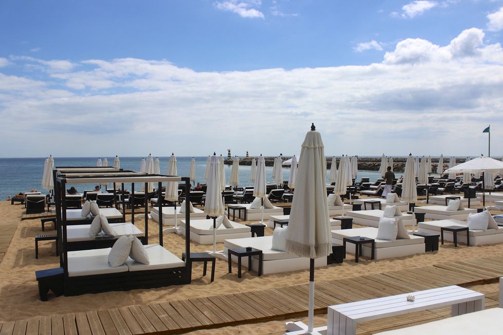 Resort, Architecture, Restaurant, Vacation, Table, Furniture, Marina, Real estate, Sea, Dock, 