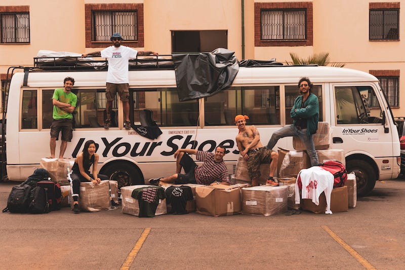 a group of people sit on a bus