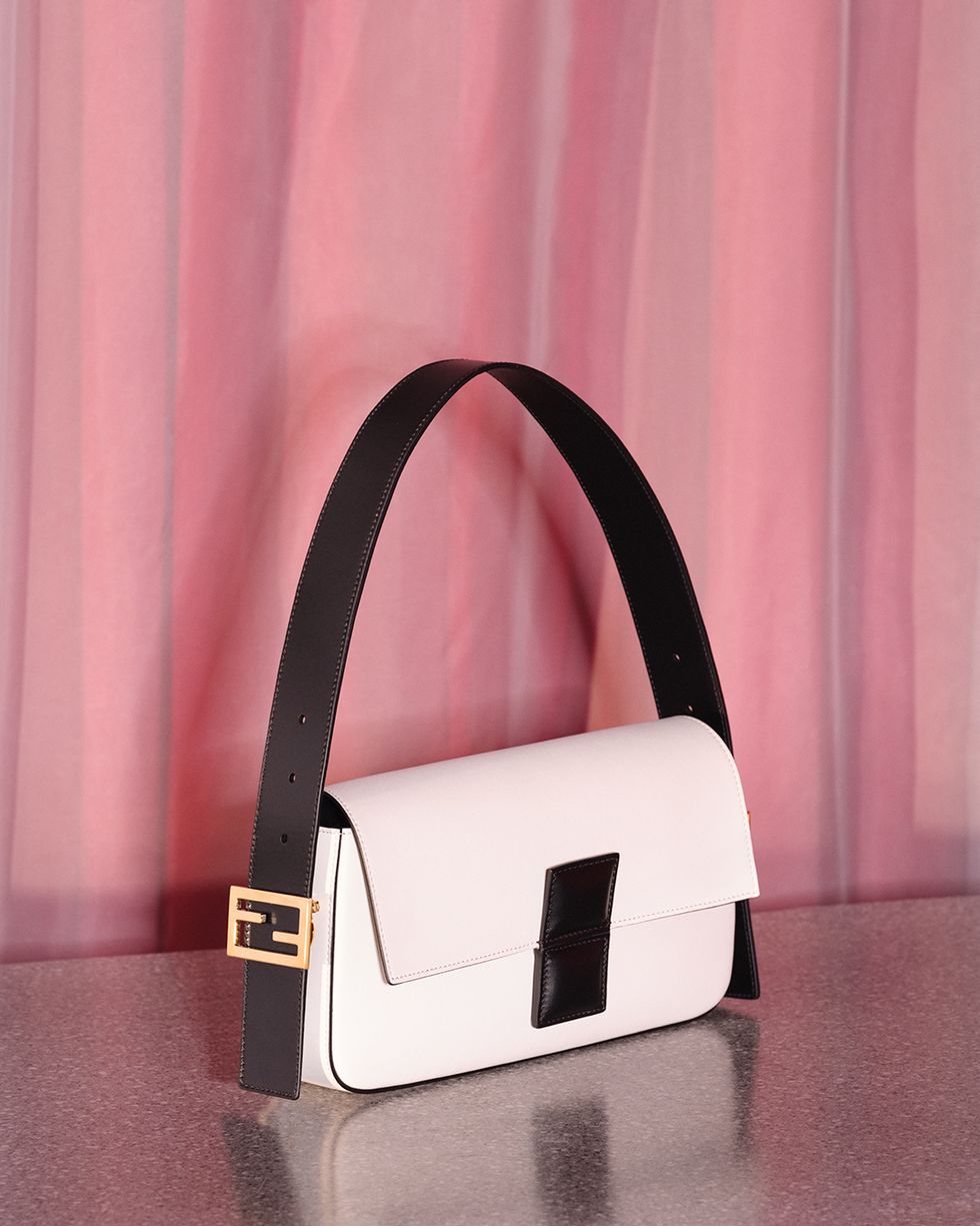 a white and black purse